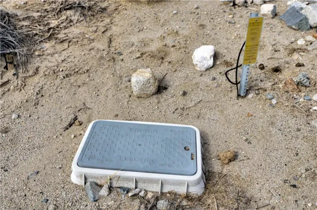 a sign that is on a brick wall