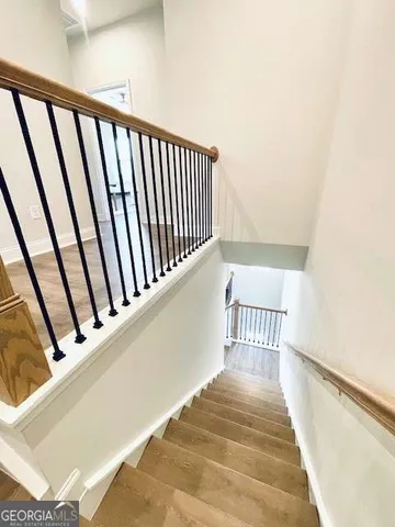 a view of balcony with wooden floor