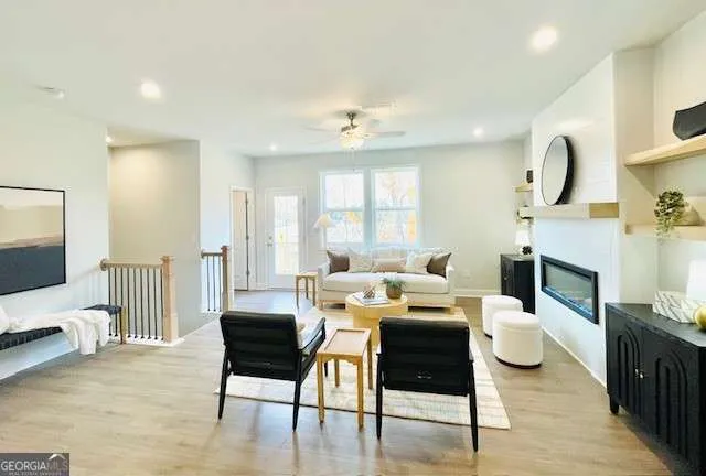 a view of a livingroom with furniture and a fireplace