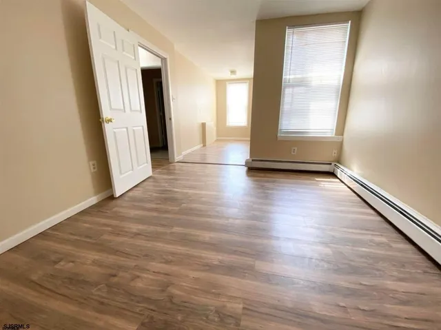 wooden floor in a hall with wooden floor