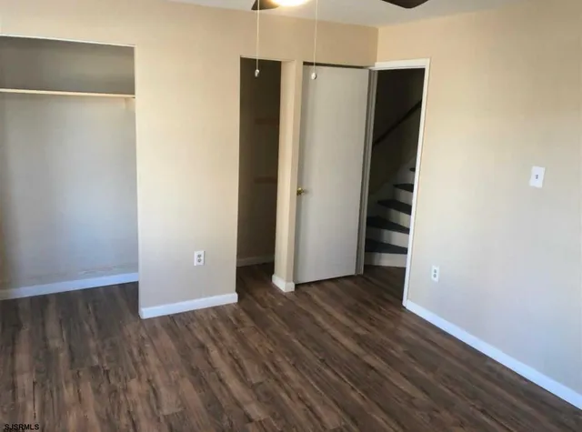 a view of an empty walk in closet