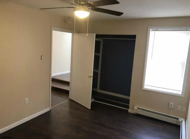a bathroom with a sink a toilet and bathtub