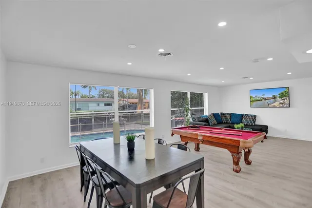 a room with furniture and wooden floor