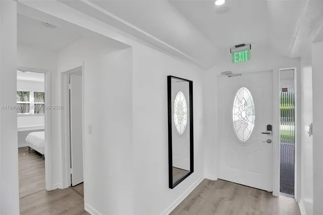 a view of dining room with wooden floor