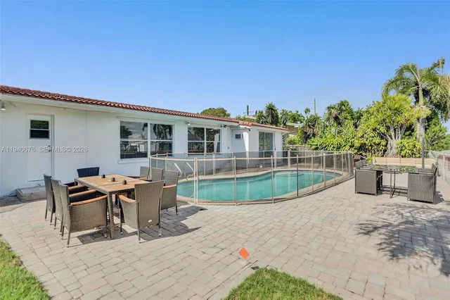 a view of a house with sitting area