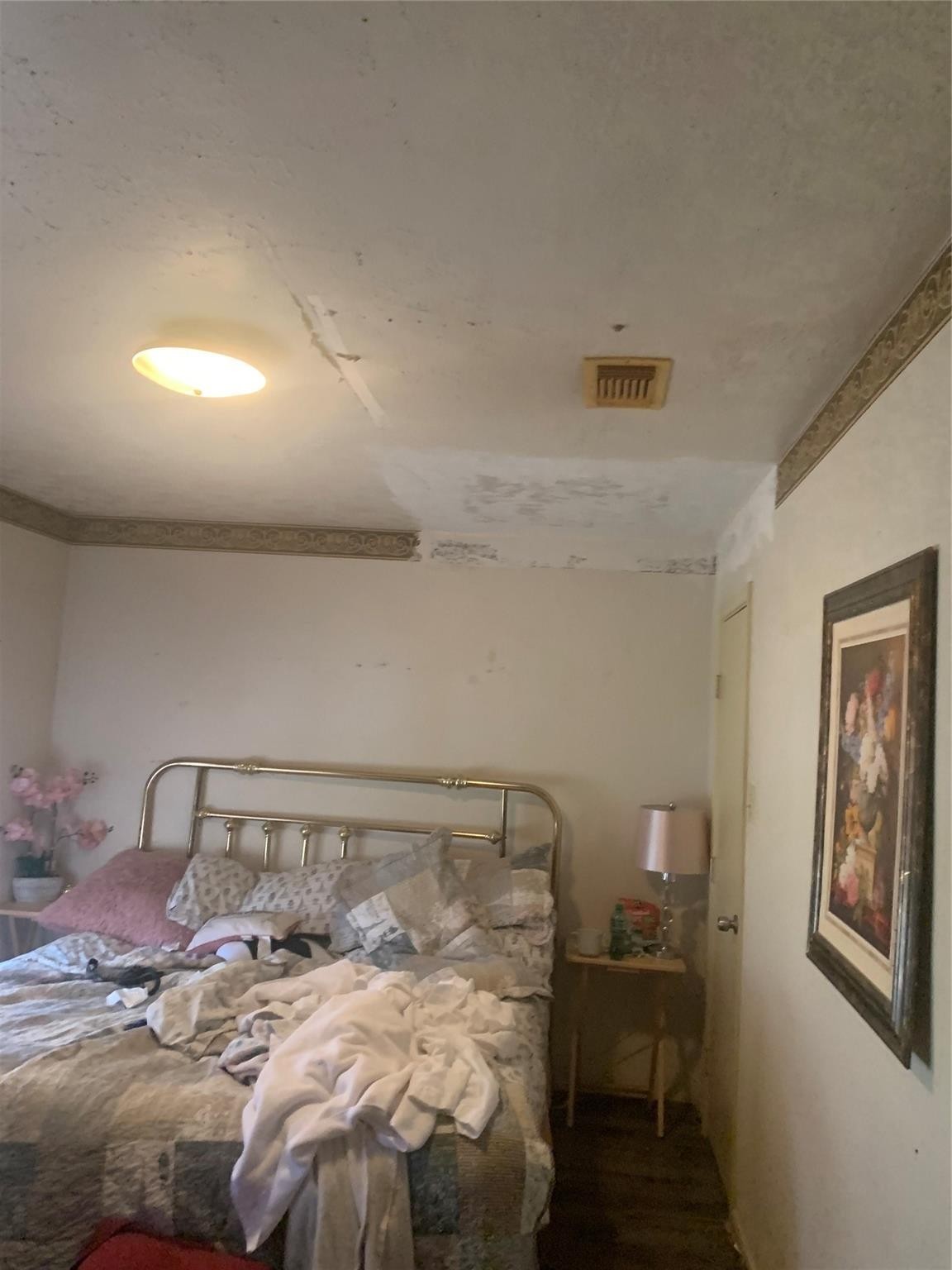 3250 Walhalla Drive Houston, TX 77066 - Photo 14 of 15 a bed sitting in a bedroom next to a window