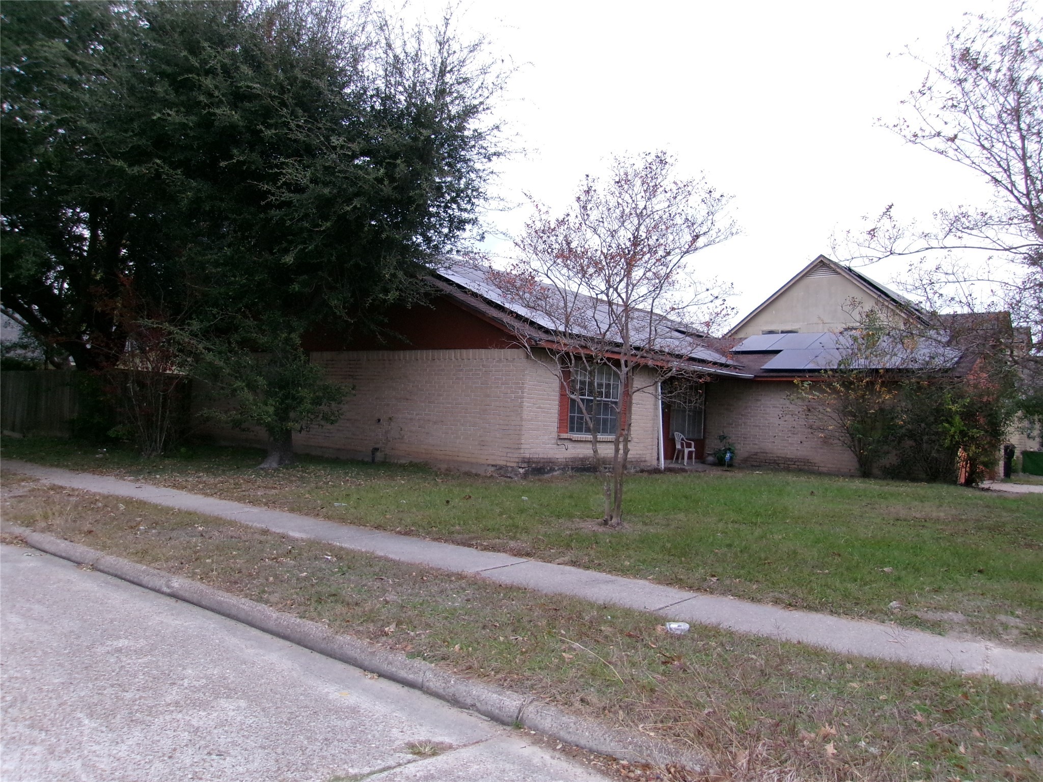 3250 Walhalla Drive Houston, TX 77066 - Photo 2 of 15 a view of a house with a yard and large tree