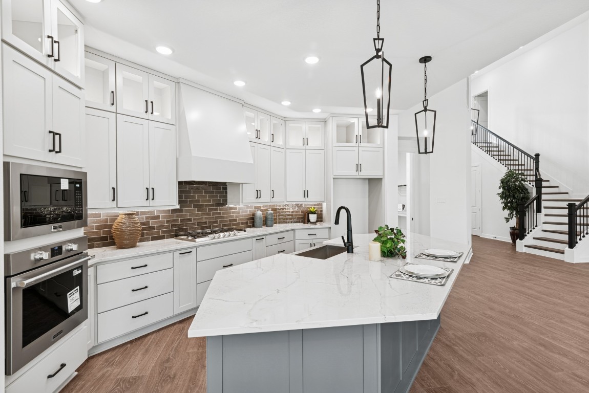 1736 Howler Way Montgomery, TX 77316 - Photo 11 of 48 Pull out spice rack & utensil drawer, LED ribbon lighting, soft close drawers/doors too!