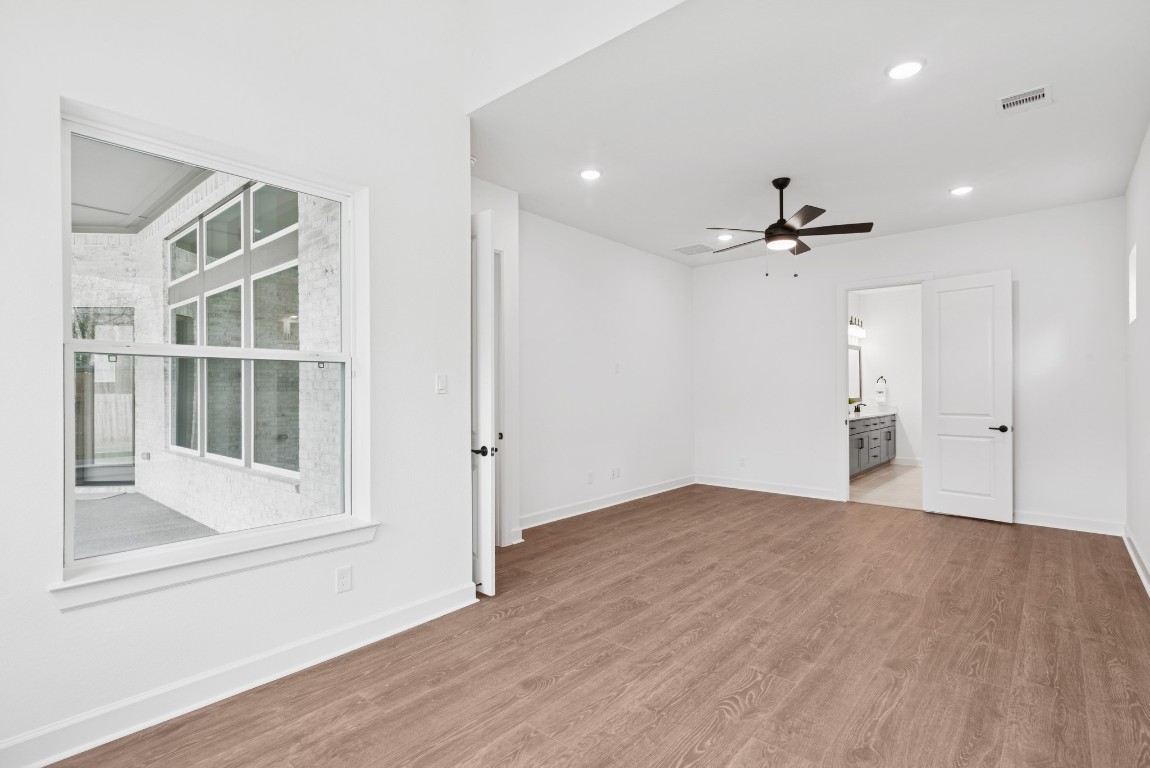 1736 Howler Way Montgomery, TX 77316 - Photo 19 of 48 Another view of Master bedroom from sitting room. Note window looking out to patio.