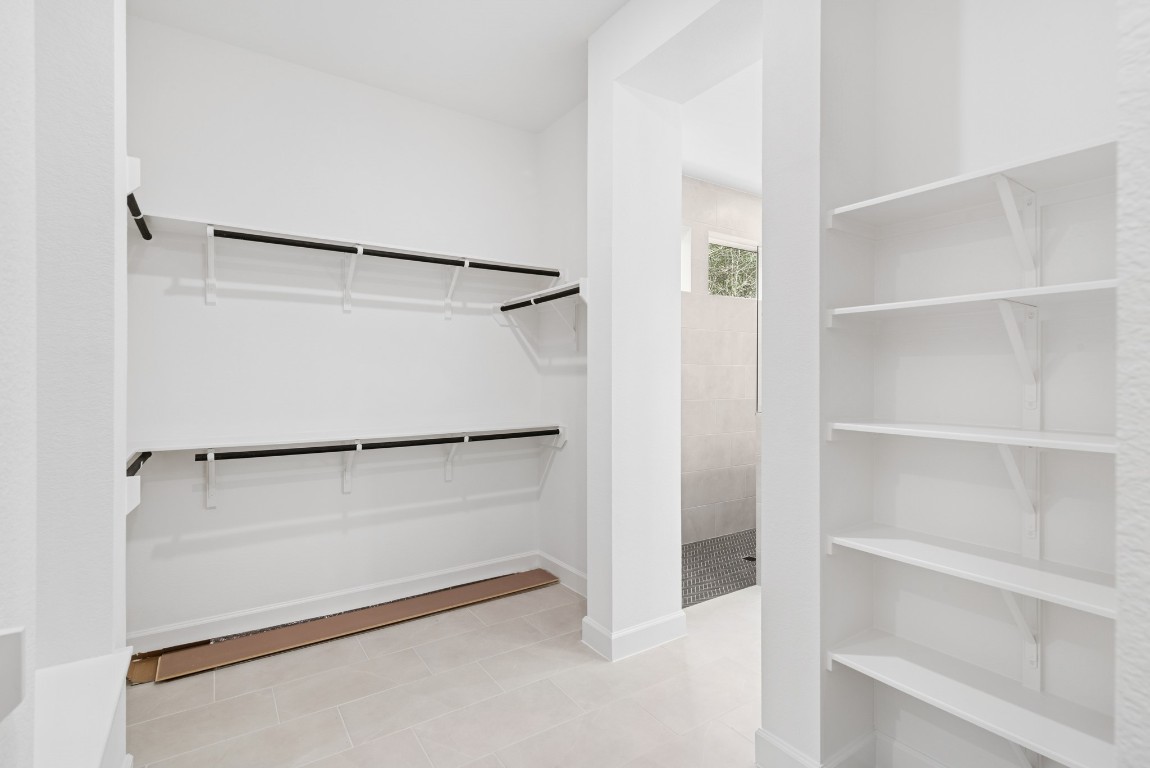 1736 Howler Way Montgomery, TX 77316 - Photo 23 of 48 His and her walk in closets too!