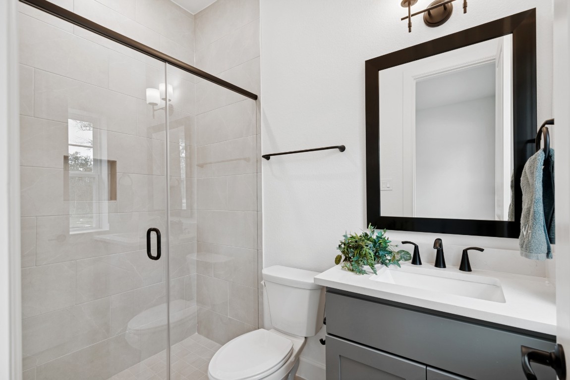 1736 Howler Way Montgomery, TX 77316 - Photo 25 of 48 Ensuite bath with walk in shower at 1st floor guest bedroom