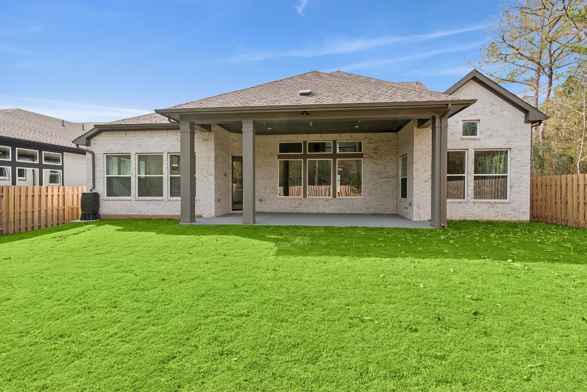 1736 Howler Way Montgomery, TX 77316 - Photo 37 of 48 Full gutters, sprinkler system and brick exterior!