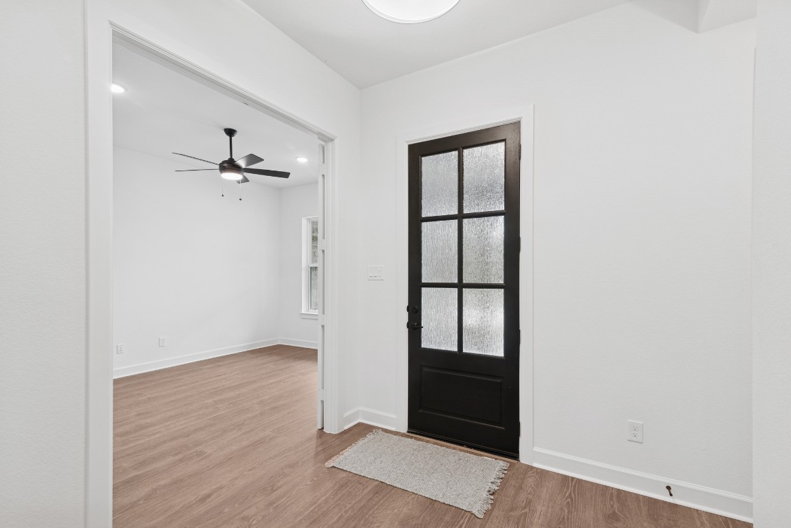 1736 Howler Way Montgomery, TX 77316 - Photo 5 of 48 Open entry with 8 ft front door. Study with glass French doors and high ceilings.