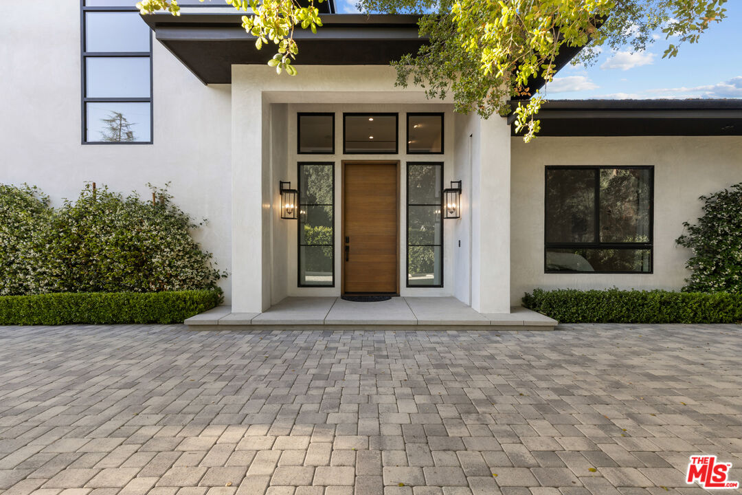 17401 Rancho Street Encino, CA 91316 - Photo 4 of 48 a view of a entryway door front of house