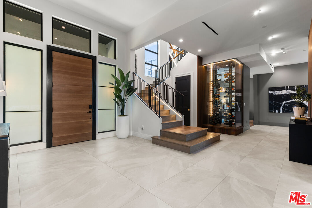 17401 Rancho Street Encino, CA 91316 - Photo 8 of 48 a view of a room with gym equipment