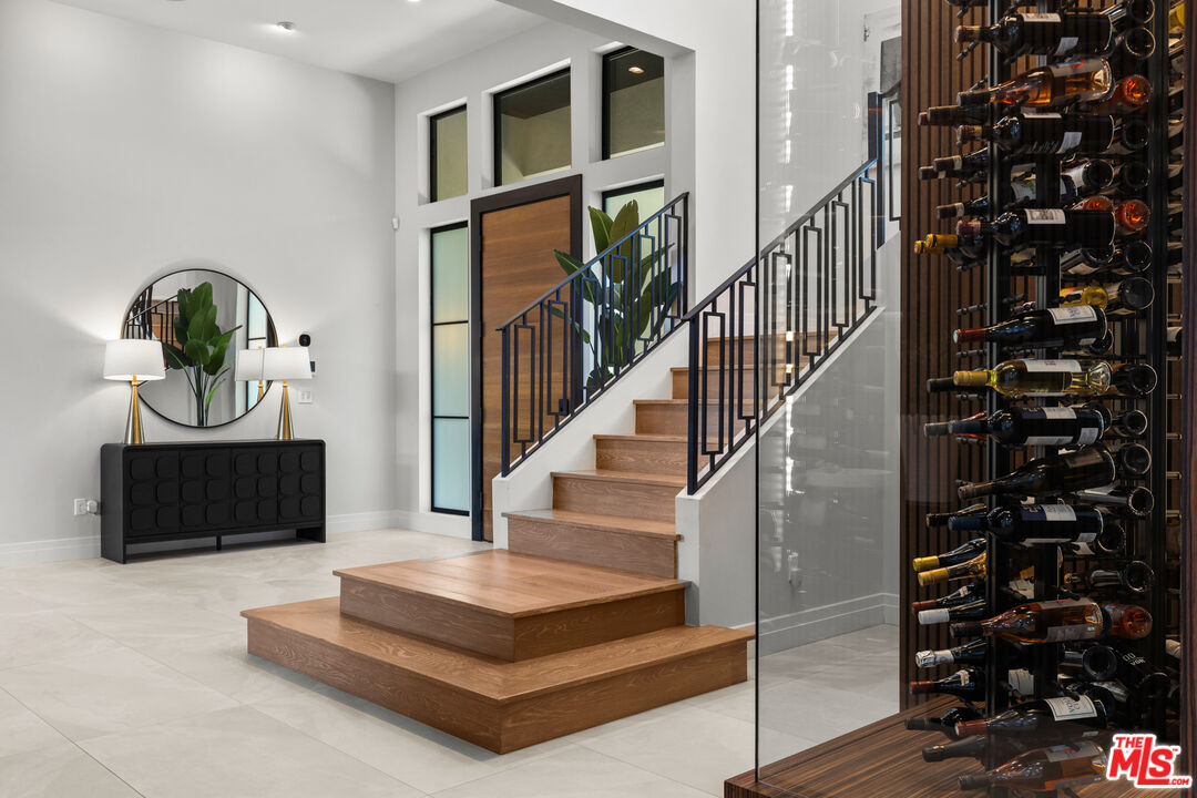 17401 Rancho Street Encino, CA 91316 - Photo 9 of 48 a view of entryway livingroom and hall with wooden floor