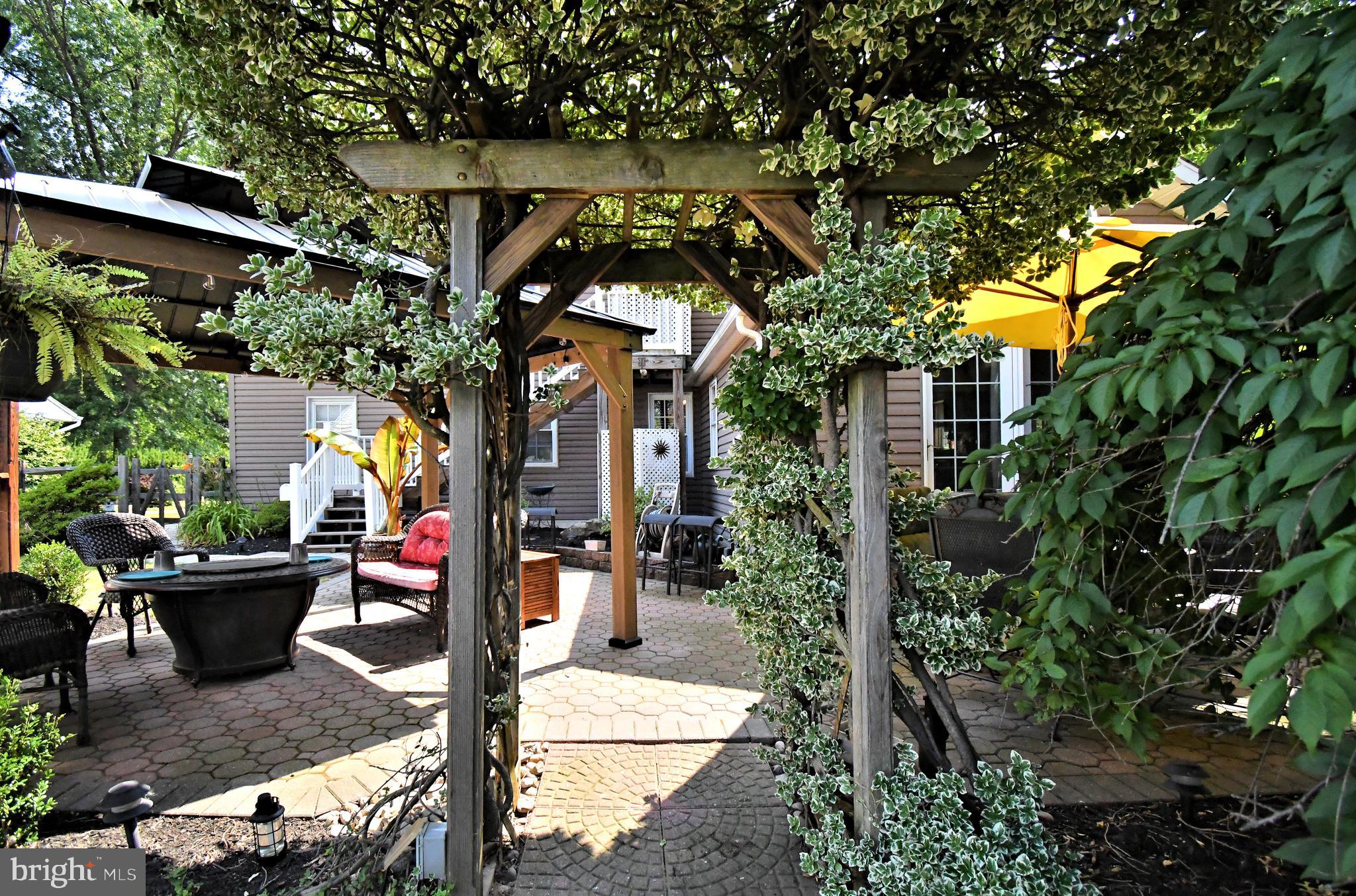 1031 Cardinal Road Norristown, PA 19403 - Photo 86 of 94 Gorgeous vinca covered vine arbor