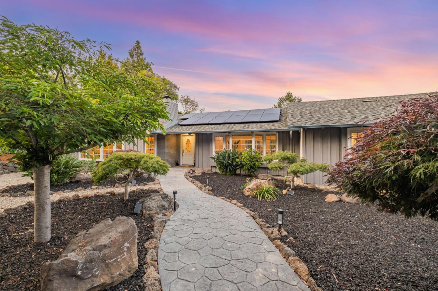 770 Graham Hill Road Santa Cruz, CA 95060 - Photo 2 of 83 a front view of a house with garden and porch