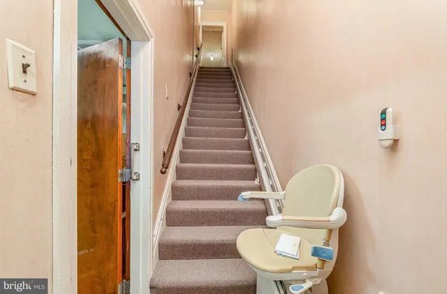 a bedroom with furniture and a bed