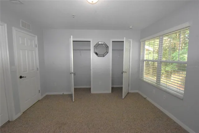 a view of a room with an entryway