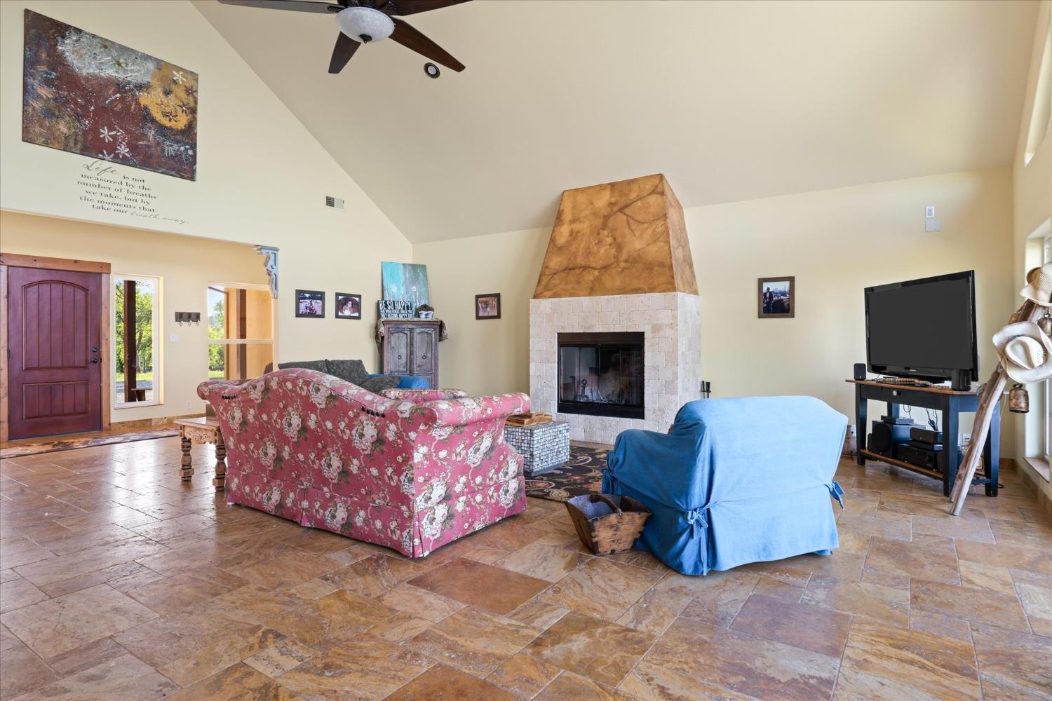6399 Filly Lane Angels Camp, CA 95222 - Photo 13 of 49 a living room with furniture and a fireplace