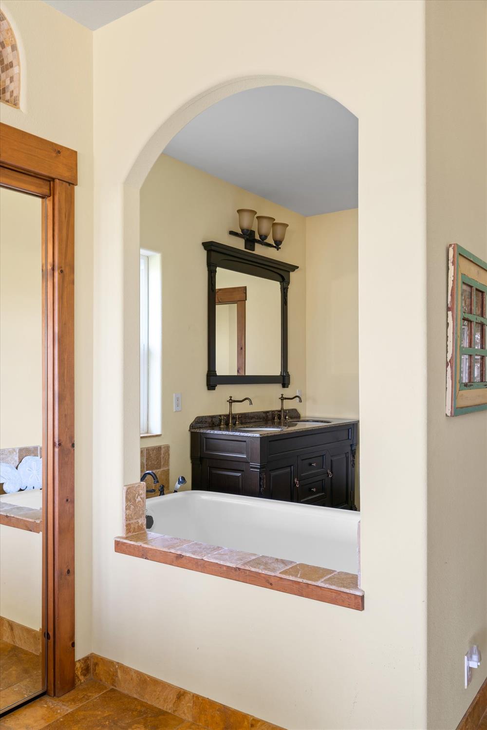 6399 Filly Lane Angels Camp, CA 95222 - Photo 22 of 49 a bathroom with a bathtub and a window