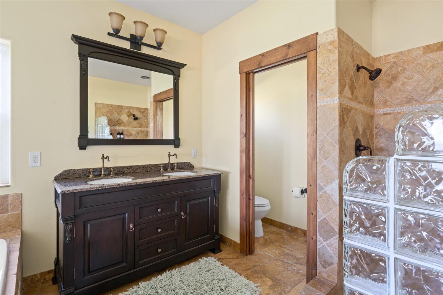 6399 Filly Lane Angels Camp, CA 95222 - Photo 24 of 49 a bathroom with a sink vanity and a mirror