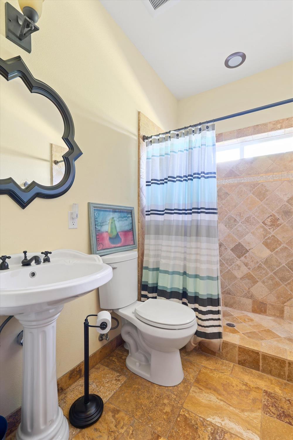 6399 Filly Lane Angels Camp, CA 95222 - Photo 32 of 49 a bathroom with a sink toilet and shower