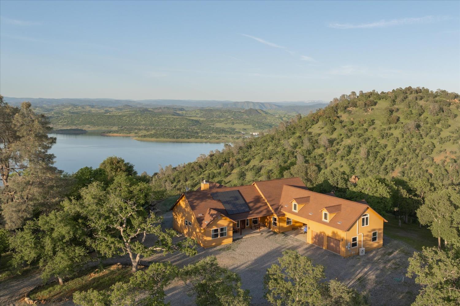 6399 Filly Lane Angels Camp, CA 95222 - Photo 4 of 49 an aerial view of a house with a lake view