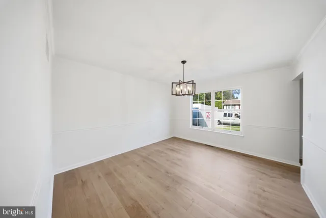 an empty room with window