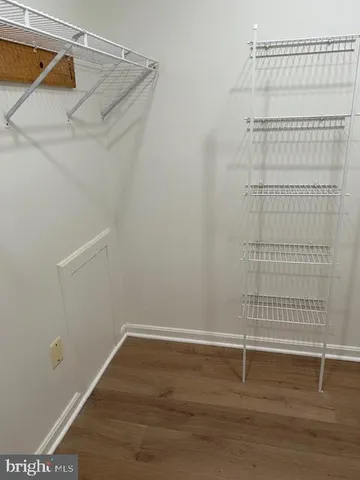 a view of a room with racks on the wall