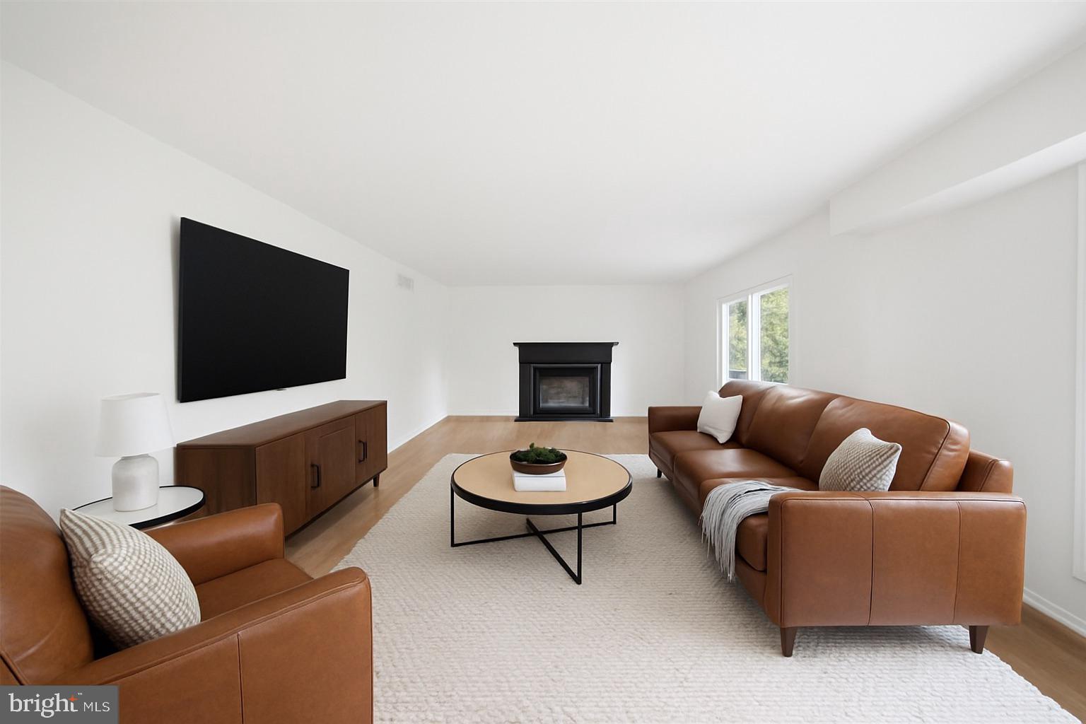 9801 Old Frank Tippett Road Upper Marlboro, MD 20772 - Photo 4 of 35 Virtual Staging Image Family room with Fireplace