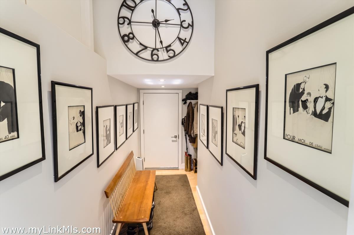 20 Edson Forest Road West Tisbury, MA 02568 - Photo 28 of 47 Hallway from mudroom to lower level