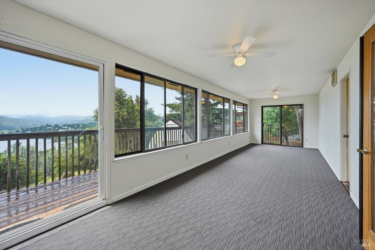 17312 Greenridge Road Hidden Valley Lake, CA 95467 - Photo 13 of 34 Sun room overlooking the view and back yard.