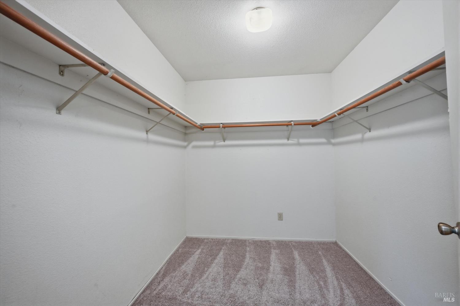 17312 Greenridge Road Hidden Valley Lake, CA 95467 - Photo 18 of 34 Primary bedroom has walk in closet.