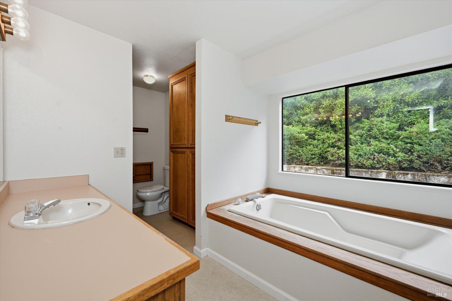 17312 Greenridge Road Hidden Valley Lake, CA 95467 - Photo 19 of 34 Primary bathroom has shower and soaking tub.
