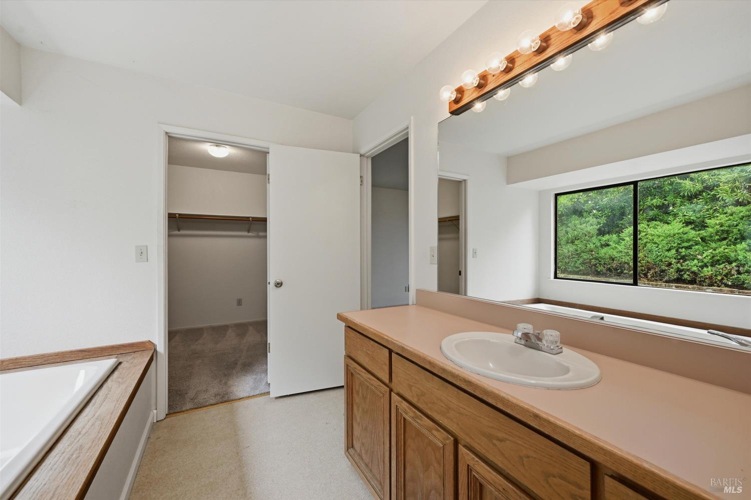 17312 Greenridge Road Hidden Valley Lake, CA 95467 - Photo 22 of 34 Primary bathroom looking toward walk in closet.