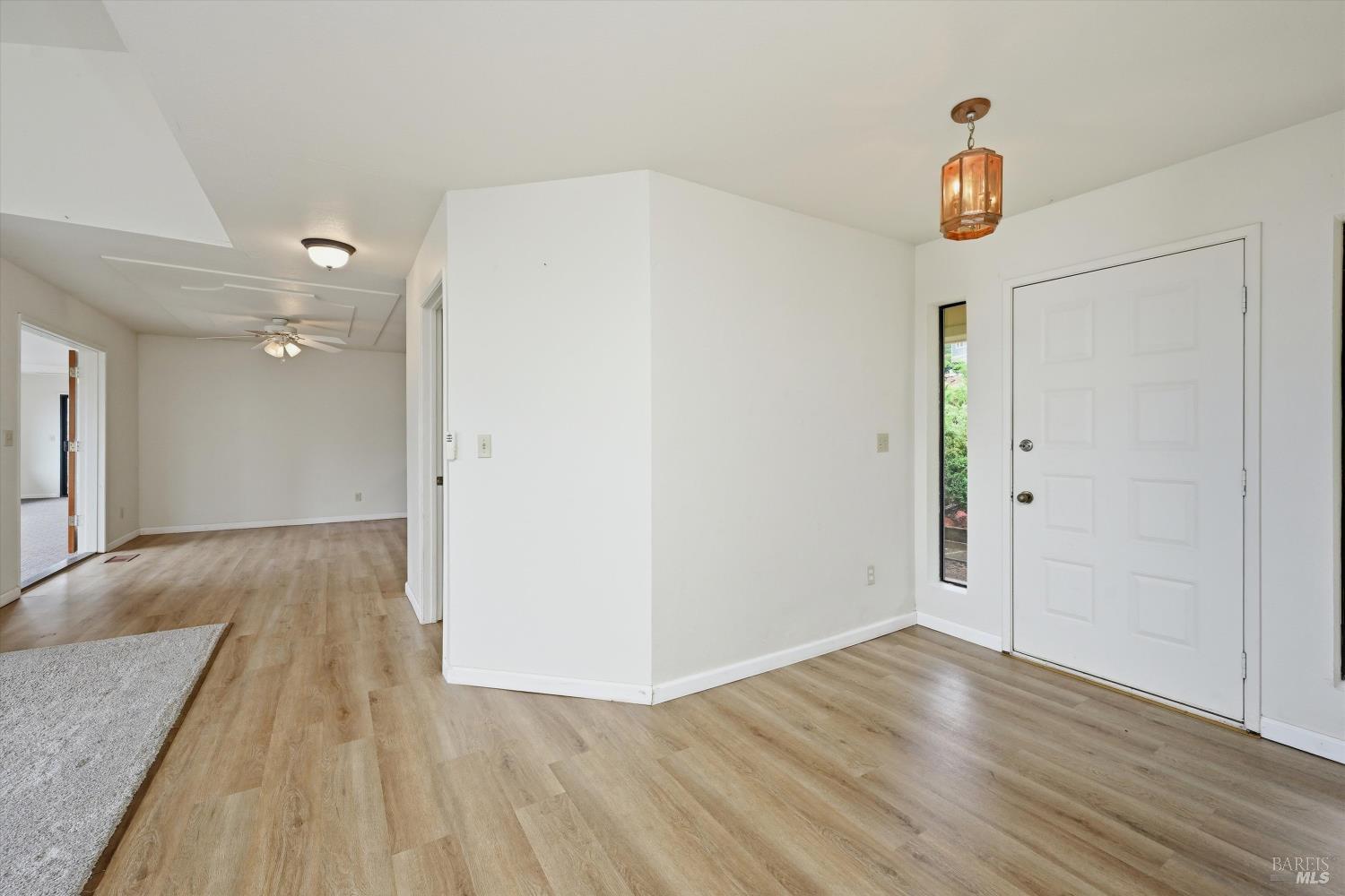 17312 Greenridge Road Hidden Valley Lake, CA 95467 - Photo 2 of 34 Formal entry looking toward dining area.