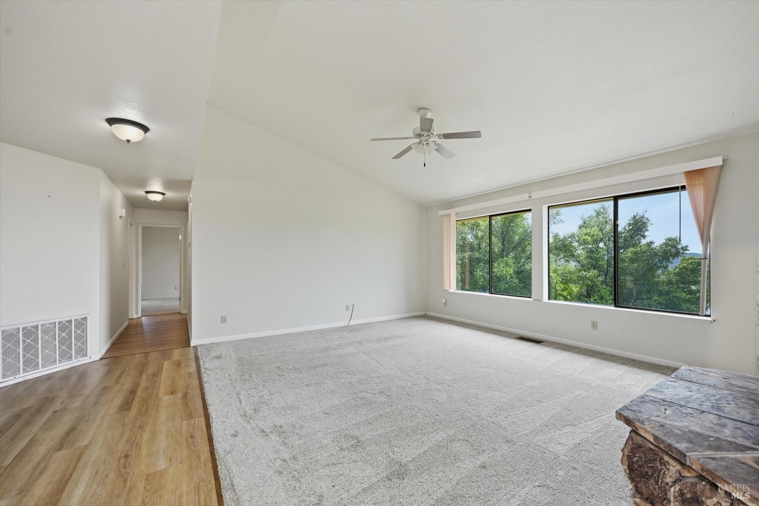 17312 Greenridge Road Hidden Valley Lake, CA 95467 - Photo 5 of 34 Living area has large windows to take in the panoramic view.