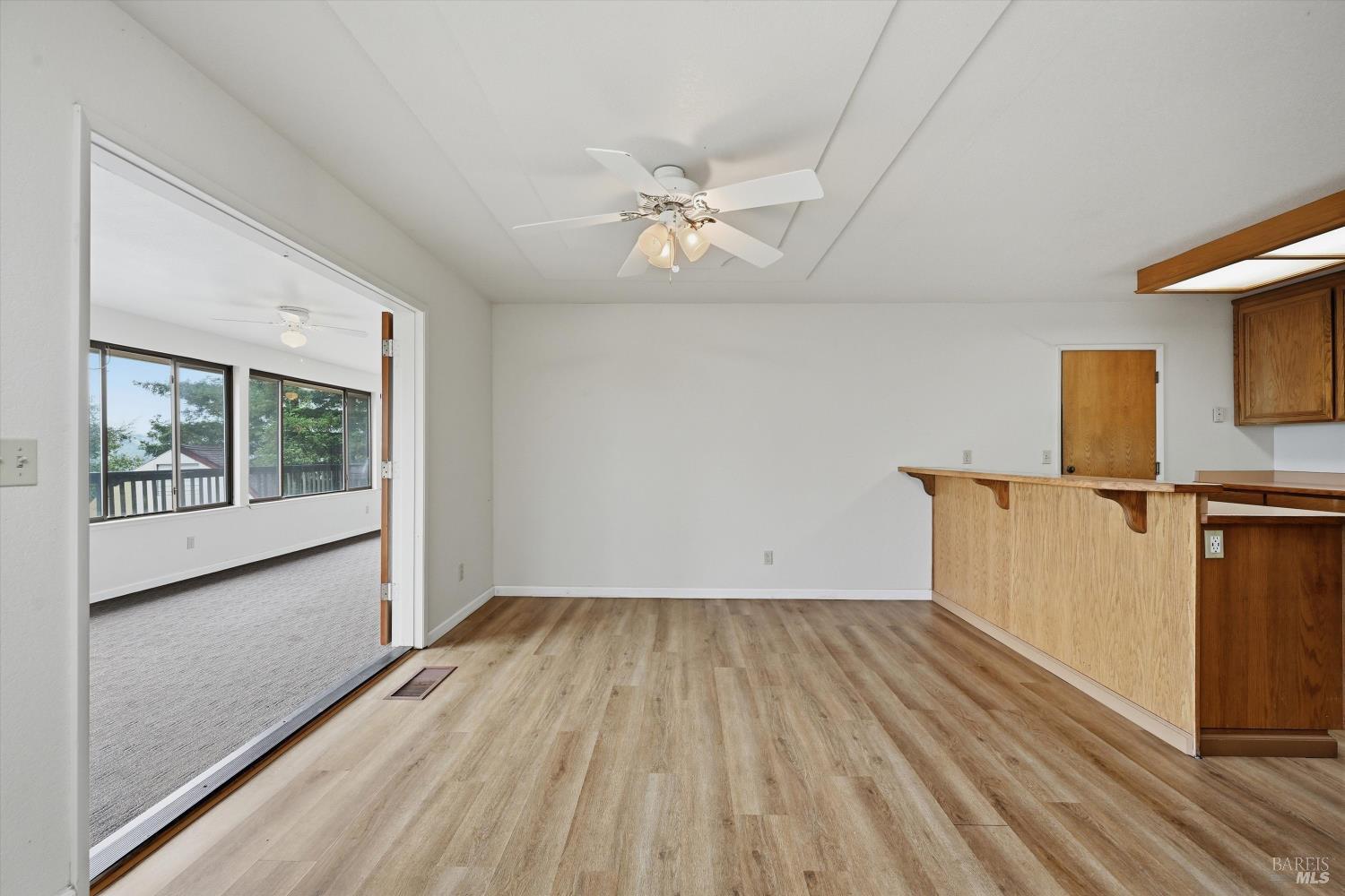 17312 Greenridge Road Hidden Valley Lake, CA 95467 - Photo 7 of 34 Dining area leading to sun room.