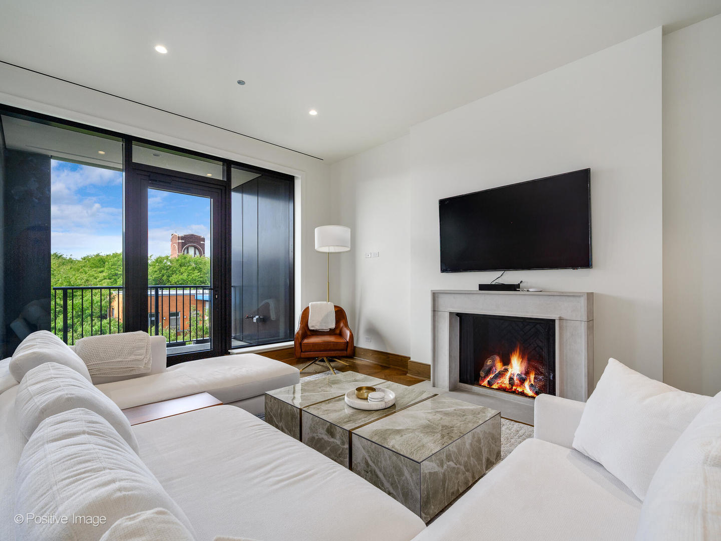 21 North May Street, Unit 505 Chicago, IL 60607 - Photo 6 of 27 a living room with furniture fireplace and flat screen tv