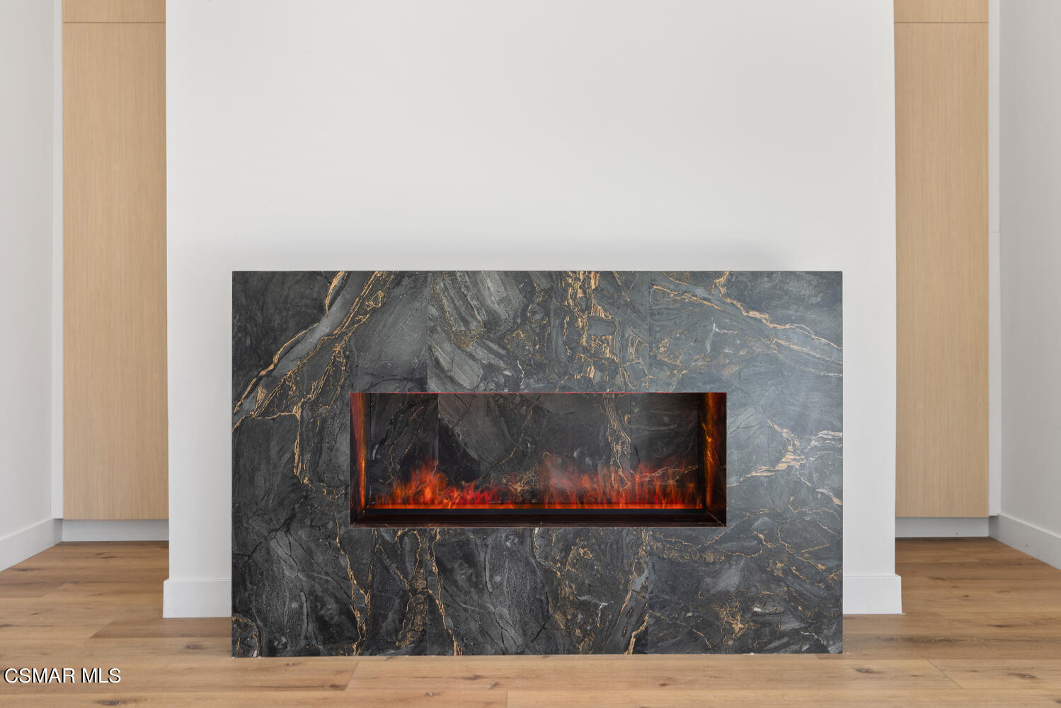 2224 Thorsby Road Lake Sherwood, CA 91361 - Photo 19 of 45 a living room with a fireplace