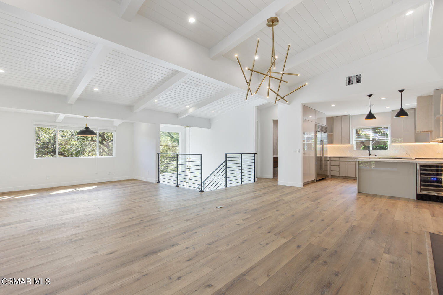2224 Thorsby Road Lake Sherwood, CA 91361 - Photo 4 of 45 a view of a kitchen with stainless steel appliances windows and a chandelier