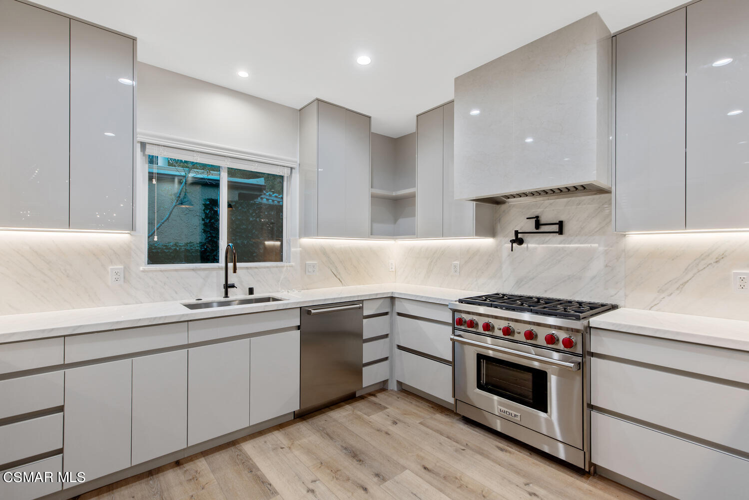 2224 Thorsby Road Lake Sherwood, CA 91361 - Photo 10 of 45 a kitchen with a stove sink and cabinets