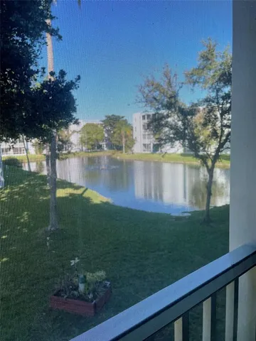 a view of a lake from a yard