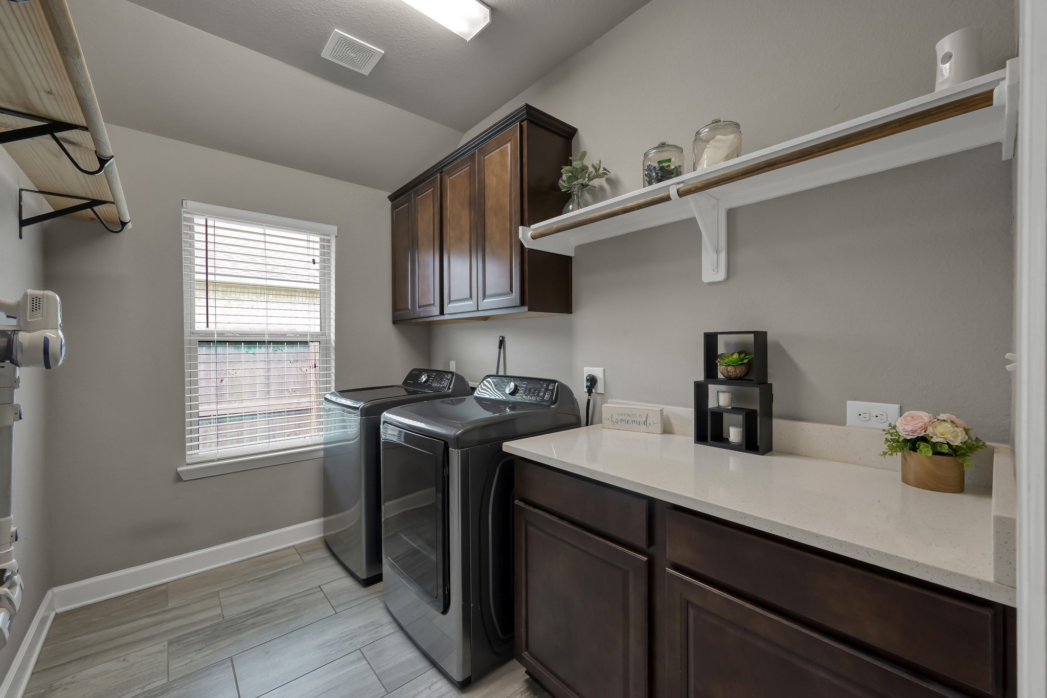 121 Dudley Road Montgomery, TX 77356 - Photo 31 of 36 Utility room has lots of room for folding and hanging clothes
