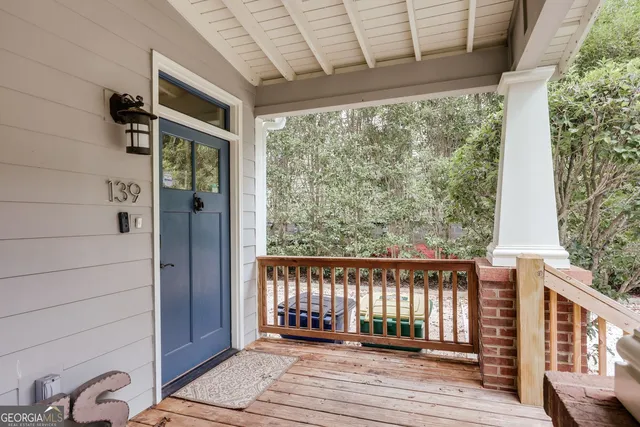 a view of wooden balcony and wooden floor
