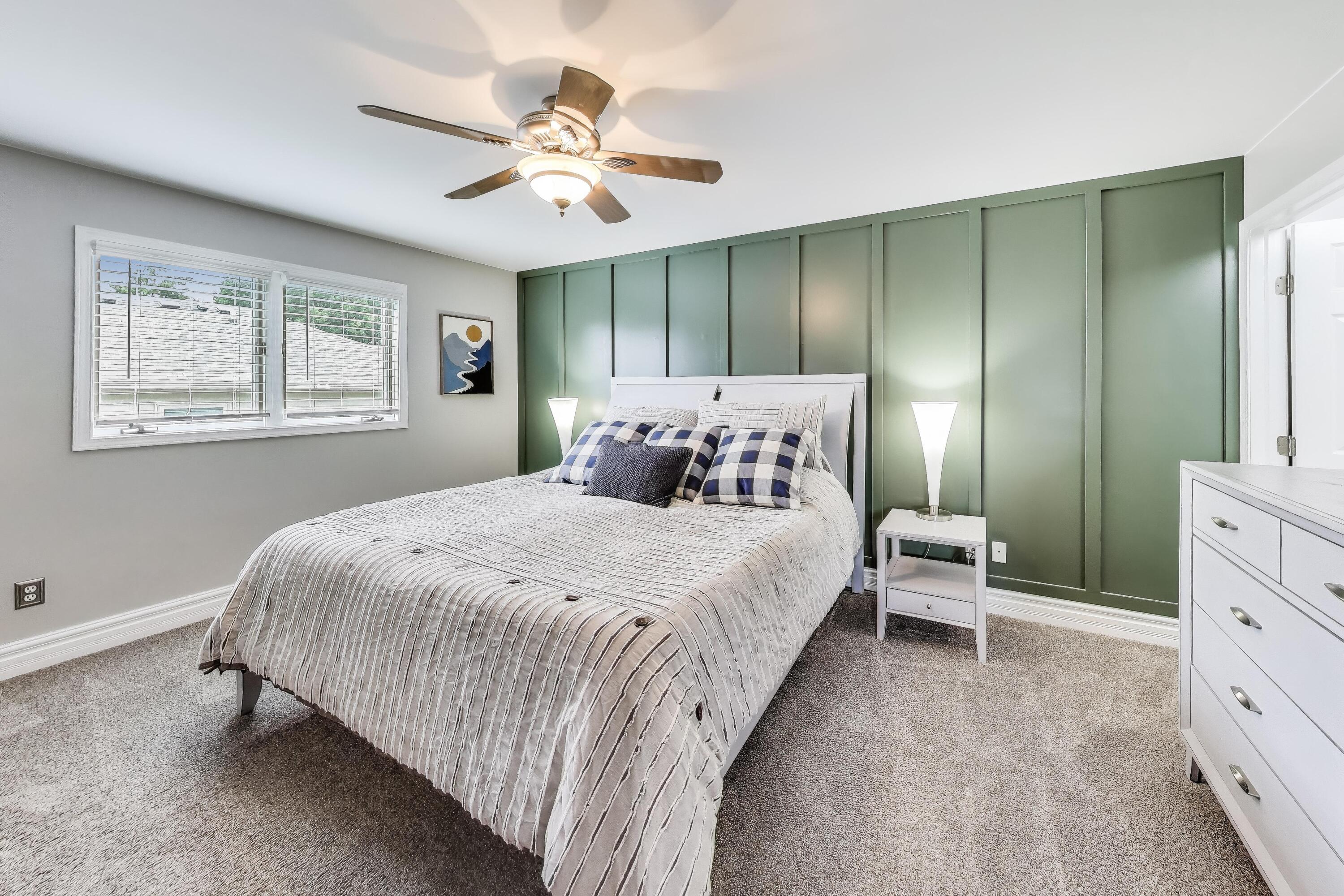 2903 Morningside Drive Crown Point, IN 46307 - Photo 11 of 39 a bedroom with a bed and a chandelier