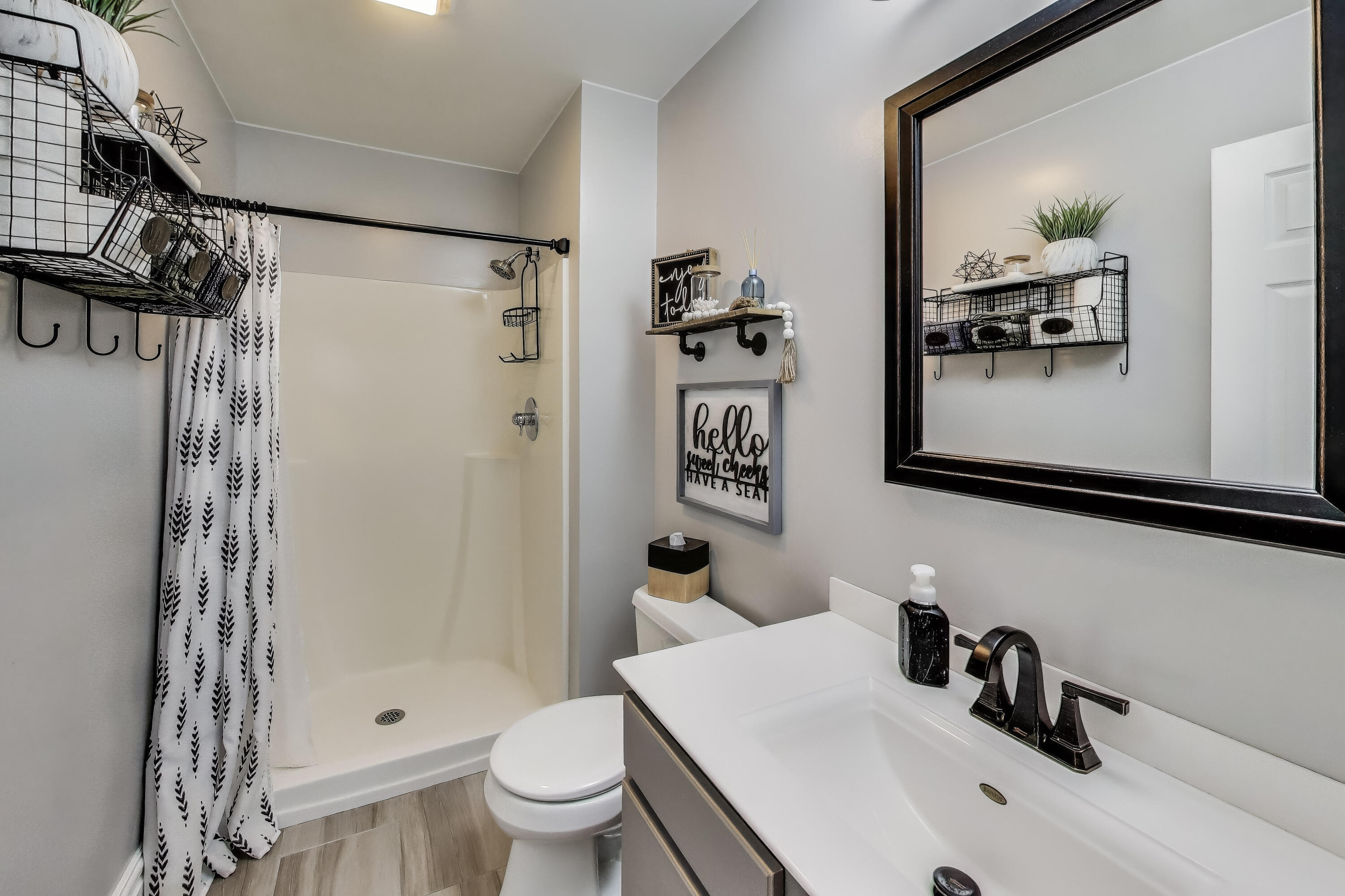 2903 Morningside Drive Crown Point, IN 46307 - Photo 13 of 39 a bathroom with a sink a toilet a mirror and shower