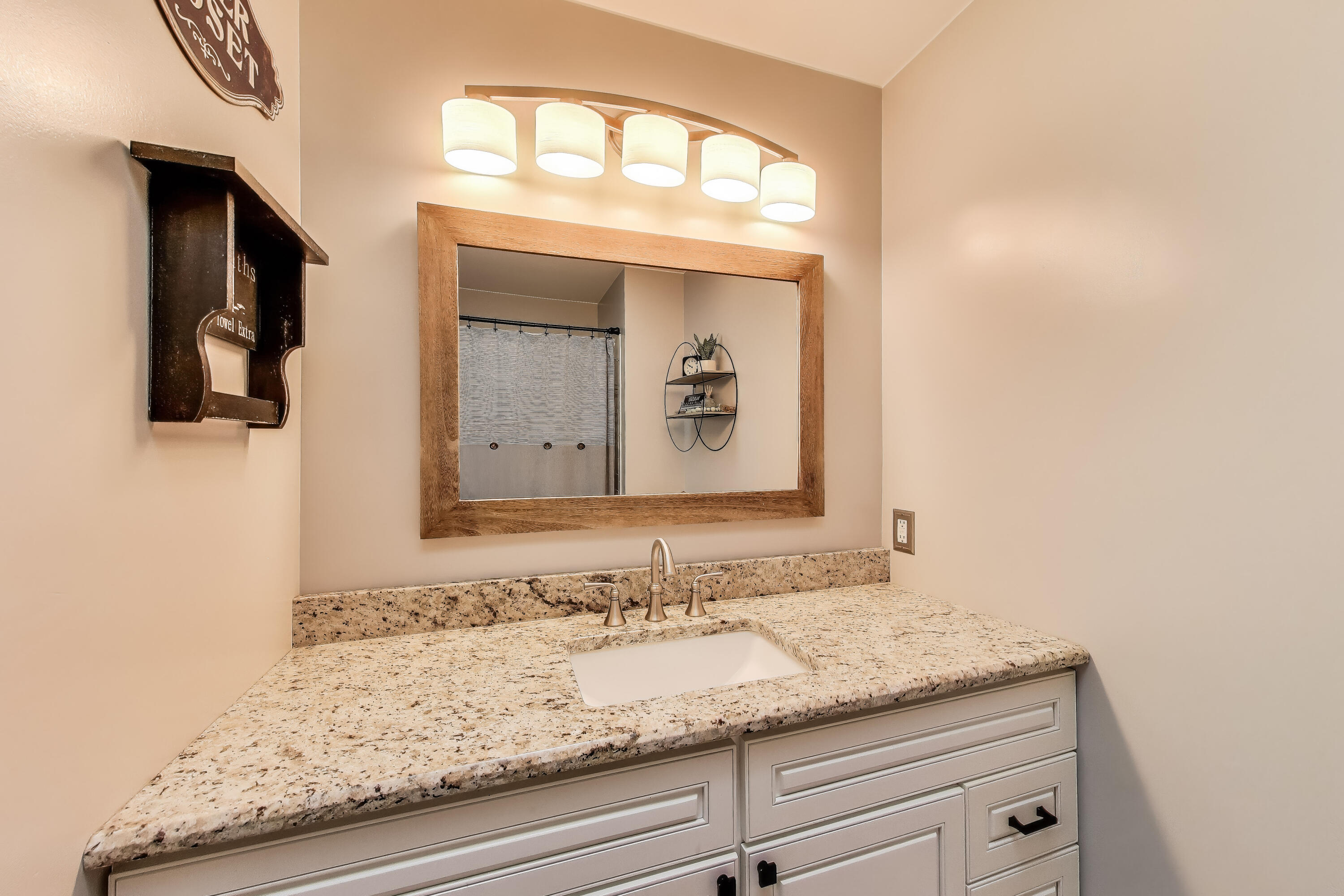 2903 Morningside Drive Crown Point, IN 46307 - Photo 19 of 39 a bathroom with a granite countertop sink and a mirror